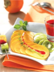 Carpaccio de kakis Persimon aux kiwis et coulis de framboises