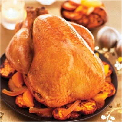 Dinde rôtie au jus d'ananas et patates douces
Photo : © Ilan Waiche