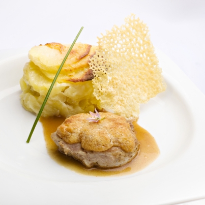 Filet mignon de porc gratiné au Saint-Nectaire
Photo : © Ludovic Combe