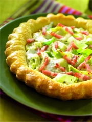 Recette Tarte à la fondue de poireaux, fromage frais et allumettes de lardons
