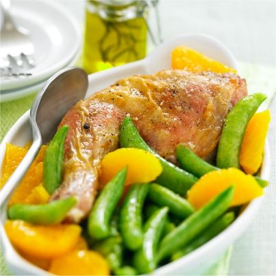 Cuisses de poulet fermier Label Rouge marinées à l'orange et pois gourmands