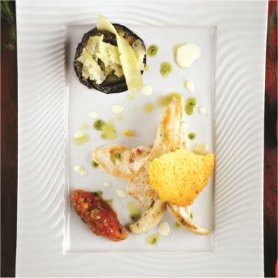 Filets de volaille fermière d'Auvergne marinés à la citronnelle et tian provençal