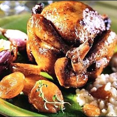 Pigeonneaux rôtis à l'ail confit, risotto aux Mirabelles de Lorraine