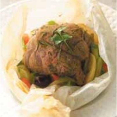 Papillotes de selle d'agneau aux herbes et courgettes aux épices