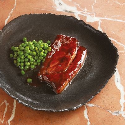 Tendrons de veau cuisinés au tandoori, petits pois à la sarriette