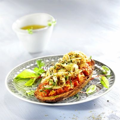 Tostada de seiches rôties sur compotée de tomates